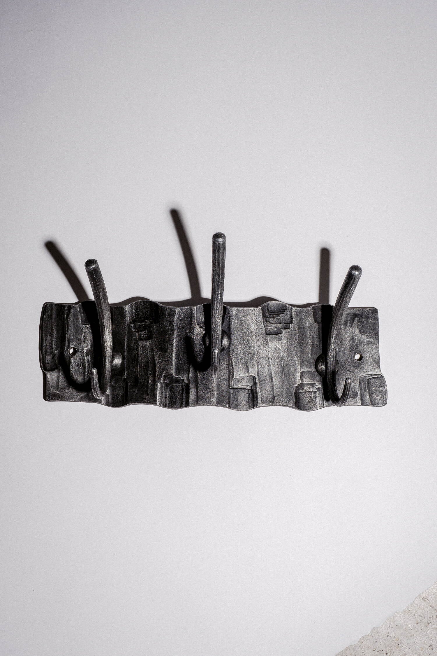 Forged wall hanger III.