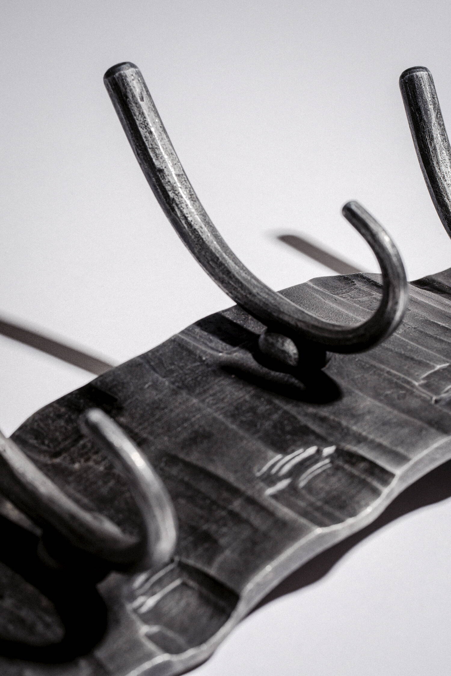Forged wall hanger III.